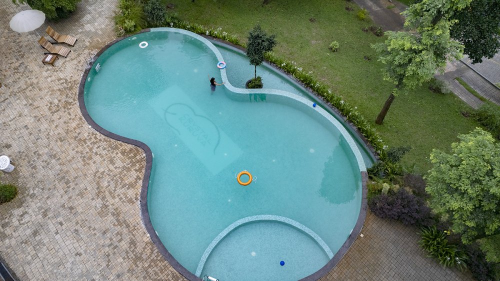 Luxury swimming pool at 5 star resort in Wayanad